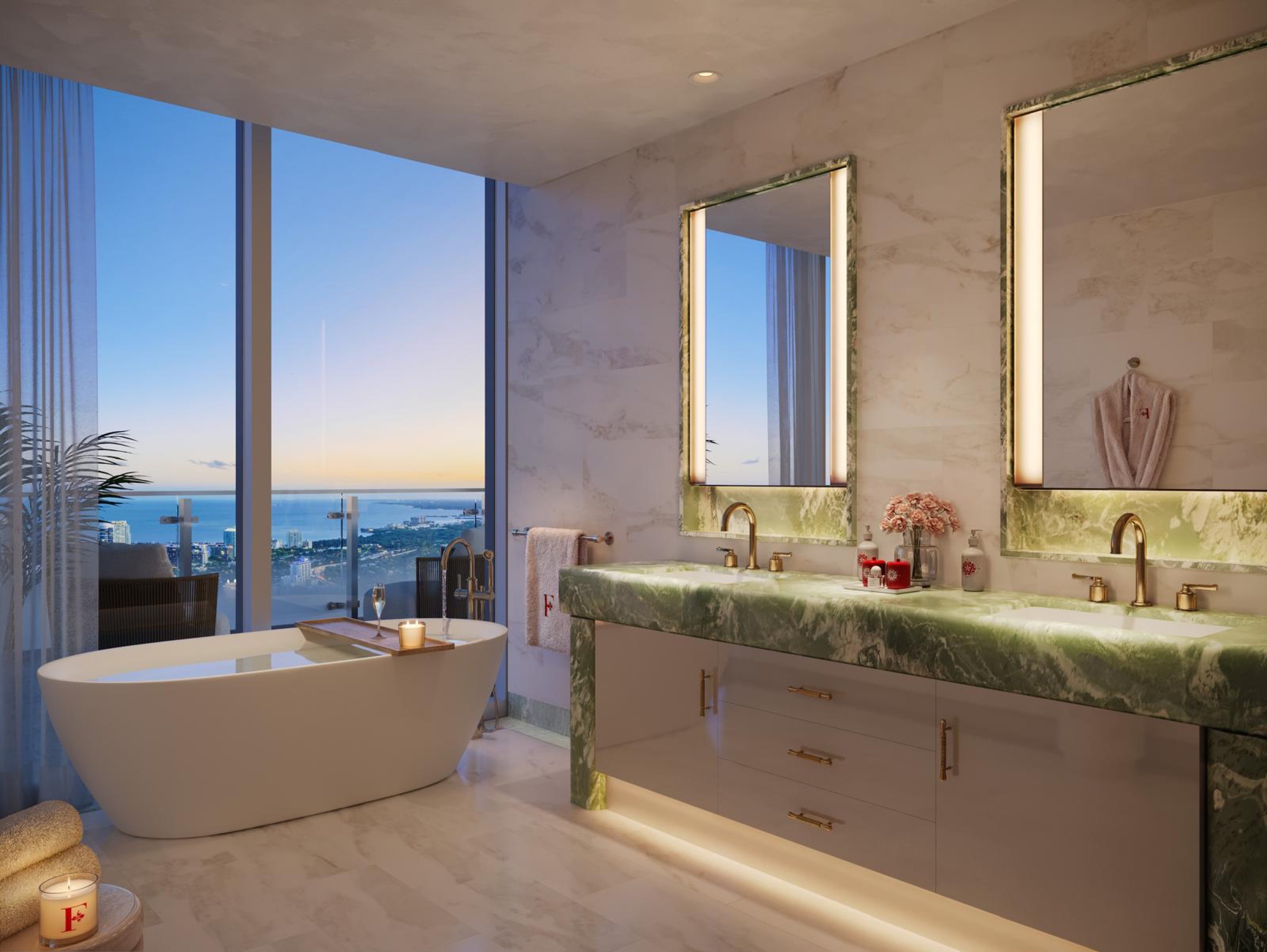 Primary bathroom with soaking tub at sunset