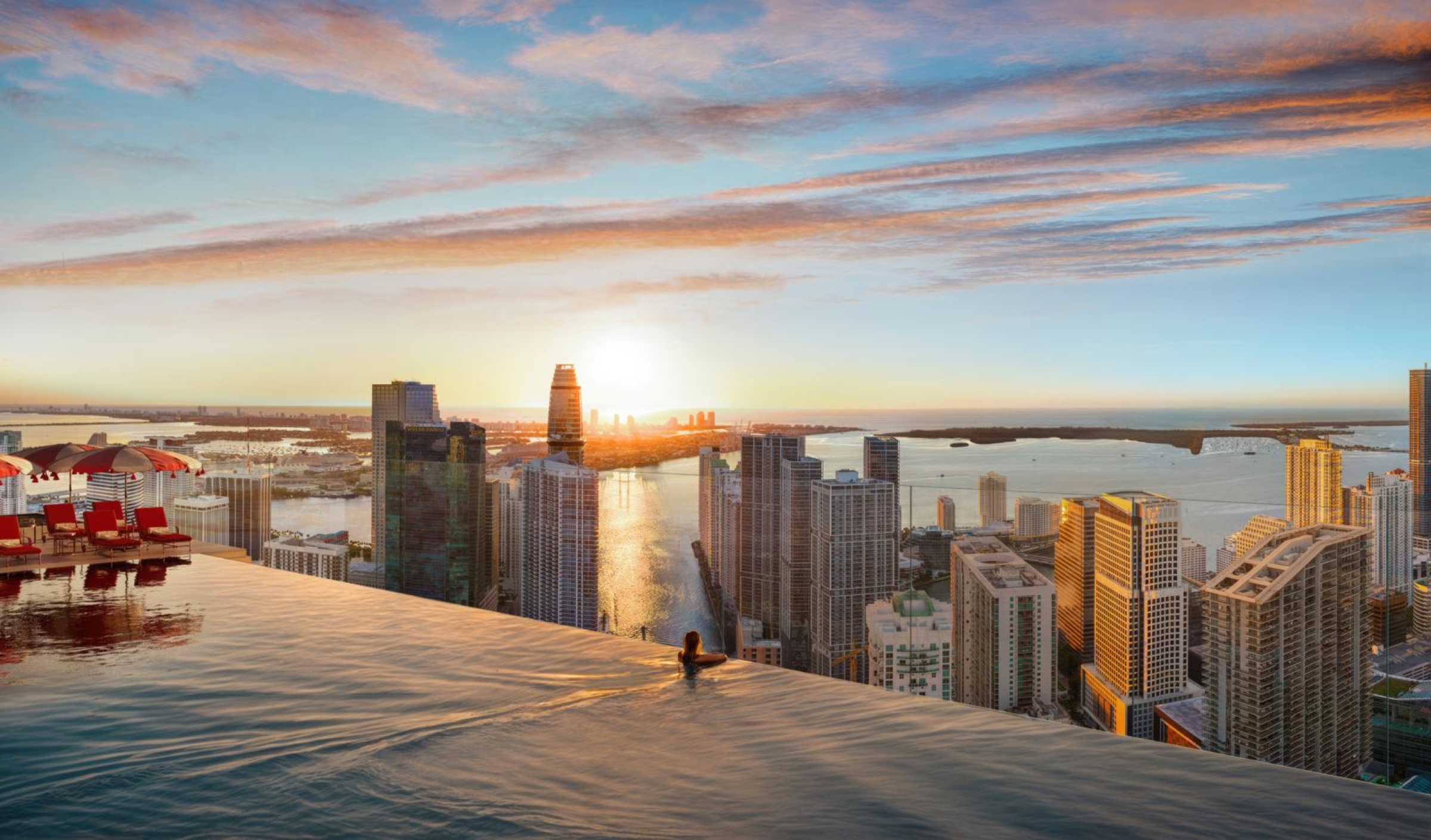 The infinity edge of Faena Beach, the 64th-floor pool, overlooking the Miami skyline at sunset